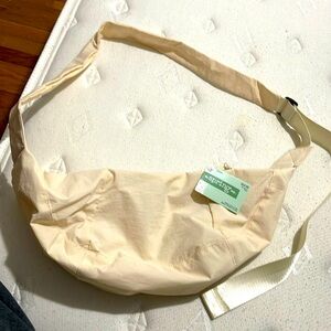 Brand new Crossbody bag and cream color